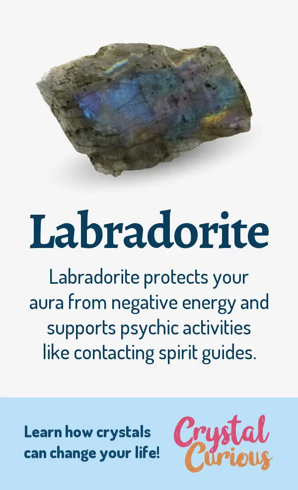 Labradorite Meaning & Healing Properties. Labradorite protects your aura from negative energy and supports psychic activities like communicating with spirit guides. Learn  crystal healing for beginners & all the gemstones properties at CrystalCurious.com. Chakra healing with crystals, vibrational positive energy, stone meanings, crystal therapy. #newage #crystalhealing #positiveenergy #crystals #gemstones #energyhealing #crystalcurious